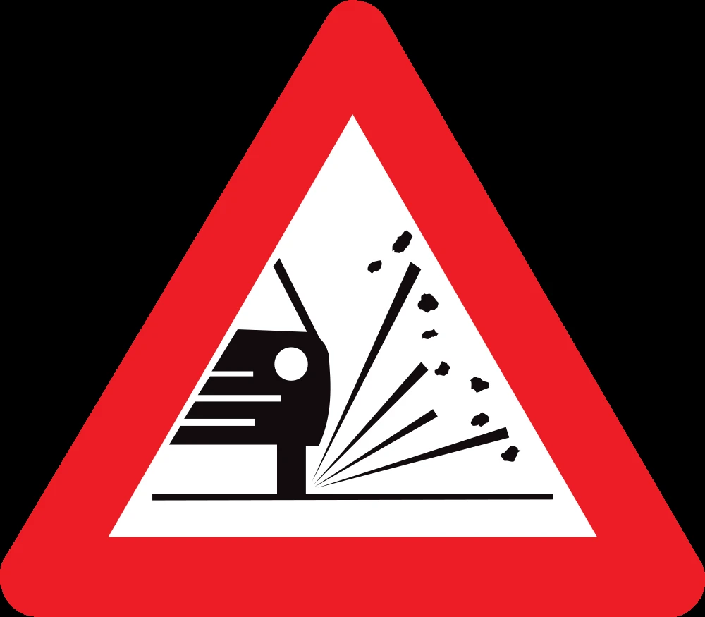 Warning for loose chippings on the road surface.