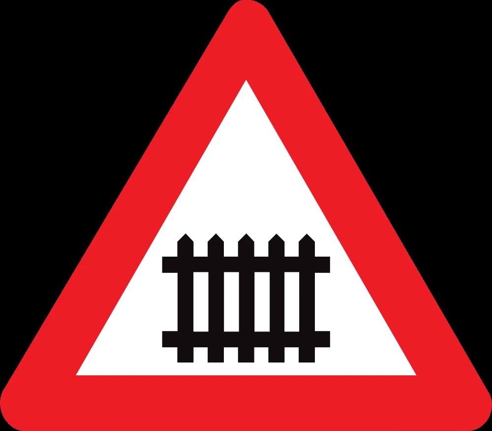 Warning for a railroad crossing with barriers.