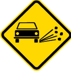 Warning for loose chippings on the road surface.