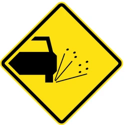 Warning for loose chippings on the road surface.
