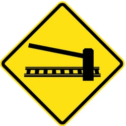 Warning for a railroad crossing with barriers.