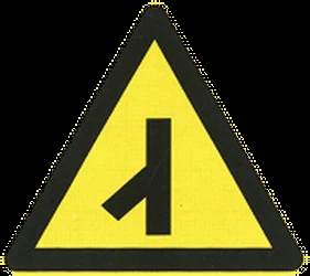 Warning for an uncontrolled crossroad with a sharp road from the left.