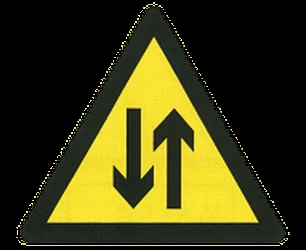 Warning for a road with two-way traffic.