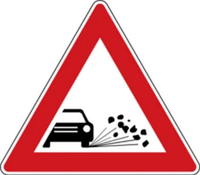 Warning for loose chippings on the road surface.
