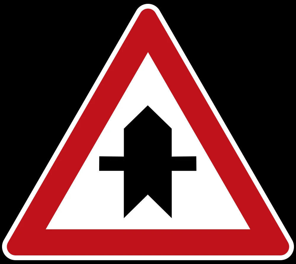Warning for a crossroad side roads on the left and right.