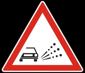 Warning for loose chippings on the road surface.