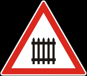 Warning for a railroad crossing with barriers.