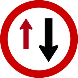 Road narrowing, give way to oncoming drivers.