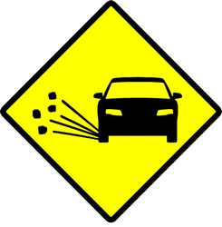 Warning for loose chippings on the road surface.