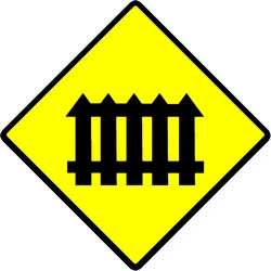 Warning for a railroad crossing with barriers.