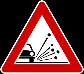 Warning for loose chippings on the road surface.