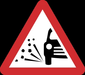 Warning for loose chippings on the road surface.