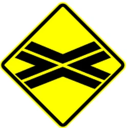 Warning for a railroad crossing without barriers.