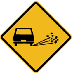 Warning for loose chippings on the road surface.