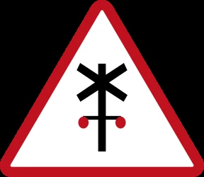Warning for a railroad crossing with barriers.