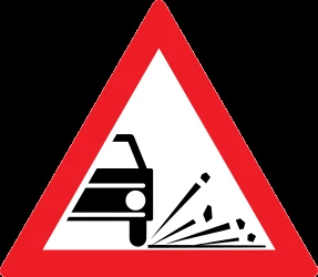 Warning for loose chippings on the road surface.