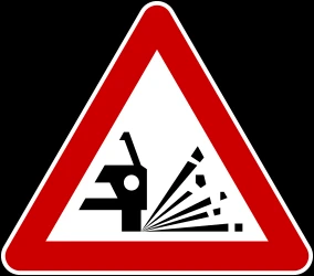 Warning for loose chippings on the road surface.