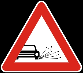 Warning for loose chippings on the road surface.