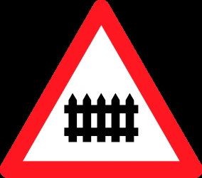 Warning for a railroad crossing with barriers.