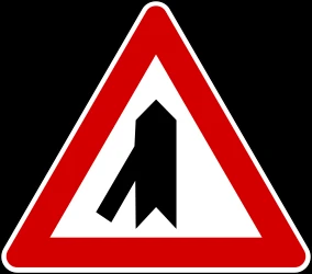 Warning for a crossroad with a sharp side road on the left.