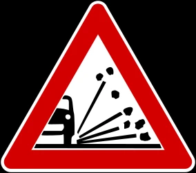 Warning for loose chippings on the road surface.
