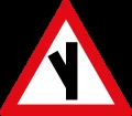 Skewed side road junction ahead to left