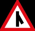 Skewed side road junction ahead to right