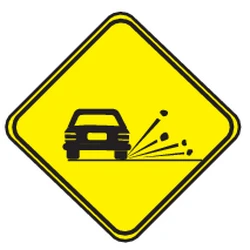 Warning for loose chippings on the road surface.
