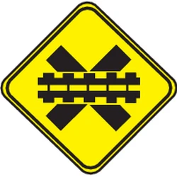 Warning for a railroad crossing without barriers.